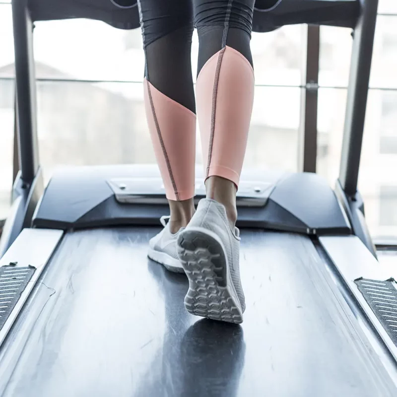 Person on treadmill in gym